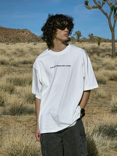 This comfortable oversized T-shirt simply accented with lettering embroidery. It's made from bio-washed high-density durable premium cotton jersey.- Ribbed crew neck- Letterning embroidery at front and back- Drop shoulder- Short sleeves- Oversized fit- Unisex wear- Minimized shrinkage and distortion Short Sleeve T-shirt With Letter Embroidery For Streetwear, White Relaxed Fit T-shirt With Letter Embroidery, Casual Streetwear Tops With Embroidered Graphics, Casual Tops With Embroidered Graphics For Streetwear, Casual Embroidered Graphic Tops For Streetwear, Cotton Drop Shoulder T-shirt With Text Print, Streetwear Crew Neck Top With Letter Embroidery, Crew Neck Tops With Letter Embroidery For Streetwear, Cotton T-shirt With Letter Print And Drop Shoulder