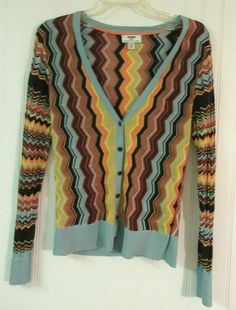 Missoni for Target cardigan sweater sz Medium V-neck cardigan button front multi color chevron stripe rayon blend good used condition bust 16" (32" around) Underarm to the bottom of the sleeve 18" 24" long There are no stains, rip or tears, unless flaws were disclosed in the above description. I will ship internationally,  via the Ebay Global Shipping Program. The one day shipping does not apply to items paid for on a Saturday or one day before a Federal Holiday when the Post Office is closed. C Multicolor Knit V-neck Cardigan, Trendy Multicolor V-neck Sweater, Casual Multicolor V-neck Cardigan, Multicolor V-neck Cotton Cardigan, Multicolor Cotton V-neck Cardigan, Retro Long Sleeve Knit Cardigan, Multicolor V-neck Sweater For Layering, Casual Multicolor Long Sleeve Cardigan, Multicolor Knit Long Sleeve Cardigan