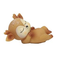 a small toy animal laying on its back