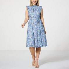 Nina Leonard Printed Smock Neck Midi Dress   Get the perfect figure-flattering shape every time when wearing this cute and classy smocked-neck midi dress from Nina Leonard. Chic Knee-length Smock Dress, Blue Knee-length Dress With Smocked Back, Elegant Smocked Dress With Floral Print For Daywear, Chic Smocked Midi Dress For Garden Party, Chic Smock Midi Dress For Garden Party, Blue Knee-length Midi Dress With Smocked Back, Blue Dress With Gathered Neckline For Brunch, Feminine Smock Midi Dress For Spring, Chic Smocked Dress For Workwear