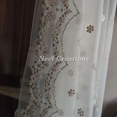 Beautiful embroidered dupatta with scallop border. Perfect for your wedding veil. It is very rich and classy dupatta. More dupatta here in our collection https://www.etsy.com/shop/neelcreations/?section_id=15880219 This Bridal Dupatta is embroidered on net with beautiful Scallop border. This can be your wedding dress chunni for Indian occasion wear for festival. This has perfect bling for you to look classy and ethnic at same time. NOTE : There might be slight color variation due to different co Elegant Net Dupatta With Intricate Embroidery, Elegant Dupatta With Intricate Embroidery, Elegant Embroidered Net Dupatta, Elegant Dupatta With Intricate Embroidery In Nida, Elegant Dupatta With Lace Work For Reception, Wedding Eid Dupatta With Intricate Embroidery, Elegant Lace Work Dupatta For Reception, Traditional Nida Dupatta With Intricate Embroidery, Unstitched Dupatta With Intricate Embroidery For Wedding