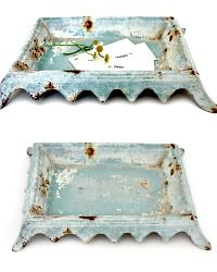 two blue trays sitting on top of each other