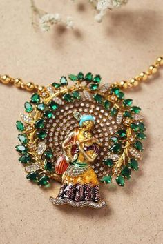 Gold toned Radha Krishna long pendant necklace with stones, crystals and Moissanite embellishments. - Aza Fashions Diamond Pendant Necklace In Fusion Style, Diamond Pendant Fusion Necklace, Fusion Style Diamond Pendant Necklace, Fusion Style Diamond Necklace For Celebrations, Temple Jewelry Style Multi-stone Pendant Necklace, Exquisite Hand Set Pendant Necklace, Temple Jewelry Pendant With Stones, Fusion Style Diamond Pendant Jewelry, Green Diamond Temple Jewelry Necklace