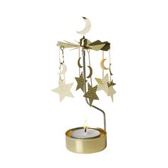 a candle holder with stars and crescents hanging from it's sides, on a white background