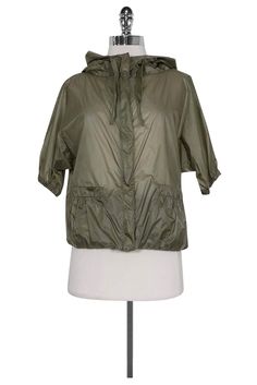 Current Boutique-Prada - Semi-Sheer Olive Rain Jacket Sz 2 Khaki Windbreaker For Spring Streetwear, Spring Nylon Utility Windbreaker, Spring Nylon Utility Outerwear, Spring Utility Nylon Outerwear, Spring Green Nylon Outerwear, Olive Outerwear For Spring Streetwear, Spring Athleisure Outerwear With Pockets, Athleisure Spring Outerwear With Pockets, Sporty Summer Outerwear With Pockets