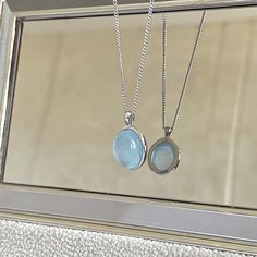 Immerse yourself in the serene beauty of the sea with our Aquamarine 925 Sterling Silver Pendant Necklace, an exquisite piece of aquamarine jewelry. Our Aquamarine S925 Silver Pendant Necklace, an ideal necklaces for women who appreciate the unique beauty of nature, is meticulously crafted from pure S925 silver. This dainty necklace features a pendant that showcases an enchanting oval-cut natural aquamarine, illuminating in varying shades of sea blue, reflecting the light it captures. Each aquam Light Blue Sterling Silver Birthstone Necklace, Light Blue Birthstone Necklace In Sterling Silver, Light Blue Sterling Silver Pendant Necklace, Light Blue Sterling Silver Round Necklace, Light Blue Round Sterling Silver Necklace, Aquamarine Gemstone Round Pendant Necklace, White Gold Aquamarine Gemstone Necklace, White Gold Aquamarine Necklace Gift, Aquamarine Necklace In White Gold For Gift