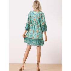 You will love this sweet dress in your spring-summer outings. This dress features a 3/4 sleeve and v-neck with a floral printed design. The gorgeous floral print dress can catch everyone's attention on every occasion. This summer boho dress is perfect for the beach, vacation, dating, wedding, birthday, anniversary, homecoming, cocktail, party, club, dinner, holiday, and casual daily wear. Summer Boho Dress With Floral Print, Knee-length, Beach Boho Dress With 3/4 Sleeves, Printed Half Sleeve Beach Dress, Spring Bohemian Boho Dress With 3/4 Sleeves, Green Bohemian Dress With Split Neck, Printed Half Sleeve Vacation Dresses, Summer Printed Dresses With 3/4 Sleeves, Spring Bohemian Dress With 3/4 Sleeves, Summer Printed Dress With 3/4 Sleeves