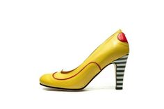 This yellow handmade high heel leather pump truly presents phrase: Shoe love is true love!Made in yellow color from softest leather they are celebration of shoes. Embellished with the piping and heart details on the back, they are special as every woman wearing them. Extremely comfortable high heel pump is every women's dream and the moment you try these beauties they become your best friend for years to come.Signature with striped heel, they are unique and recognizable as you are.Wear them with Retro Round Toe Heels For Wedding, Yellow Round Toe Heels For Wedding, Yellow Almond Toe Court Shoes For Formal Occasions, Yellow Closed Toe Court Shoes For Formal Occasions, Yellow Closed Toe Formal Court Shoes, Yellow Almond Toe Court Shoes For Spring, High Heel Yellow Court Shoes For Party, Yellow High Heel Court Shoes For Party, Yellow High Heel Court Shoes For Formal Occasions