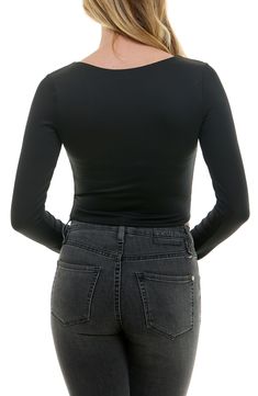 This long-sleeve t-shirt crafted in a slightly cropped silhouette from rib knit fabric is an easy basic to dress up or down. Scoop neck Long sleeves 94% nylon, 6% spandex Machine wash, line dry Imported Stretch Crew Neck Crop Top For Fall, Fall Stretch Crop Top With Crew Neck, Ribbed Long Sleeve Stretch Crop Top, Fall Cropped Long Sleeve Stretch Top, Casual Solid Cropped Long Sleeve Top, Elastane Long Sleeve Crop Top, Long Sleeve Elastane Crop Top, Casual Solid Color Cropped Long Sleeve Top, Black Elastane Crop Top For Fall