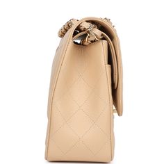 This Jumbo Classic Double Flap bag is in beige caviar leather with gold tone hardware and features a front flap with signature CC turnlock closure, half moon back pocket, and adjustable interwoven gold tone chain link and beige leather shoulder strap.The interior is lined in beige leather with a "love letter" zipper compartment under the first flap, an "outer" slit pocket under the second flap, and an interior compartment with two open pockets separated by a "lipstick" compartment.Collection: 19-series (2014) Origin: FranceCondition: Never Accompanied by: Chanel box, Chanel dustbag, carebook, felt, COA card, retail UPCMeasurements: 12" width x 8" height x 3.5" depth; 23" strap drop: 23" (13" doubled) Chanel Jumbo, Chanel Box, Hermes Birkin 25, A Love Letter, Birkin 25, Bottega Veneta Shoulder Bag, Love Letter, Flap Bag, Half Moon