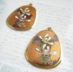 You will receive 1 vintage spring enamel flower pendant. They measure 1.5 inch by 1.25 inch (4cm by 3cm) These are very RARE and super CHEAP! These authentic vintage pendants are extremely detailed, with stunning enamel work. The pendant is brass, and has a pleasant weight to it. These enamel pendants were originally manufactured for the costume jewelry company Sarah Coventry. These are great for earrings, charms for necklaces/bracelets, anything your imagination can dish out! E508 Charms For Necklaces, Enamel Pendants, Earrings Charms, Vintage Spring, Sarah Coventry, Enamel Flower, Jewelry Companies, Coventry, Flower Pendant