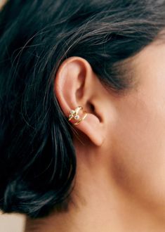 Ear cuff in gold-plated, mostly recycled brass and glass;Weight: 1.6 g / 0.03 oz;Height: 1 cm / 0.4 in Eat Cuffs, Dreamy Jewelry, Ear Cuff Jewelry, Diamond Ear Cuff, Gold Ear Cuff, Brass And Glass, Sparkly Things, Senior Prom, Birthday List