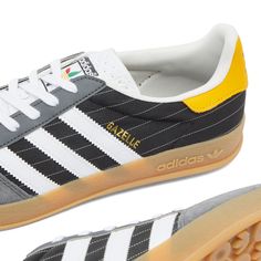 Find ADIDAS Gazelle Indoor on Editorialist. adidas are gearing up for the incoming Paris Olympics with a line-up of limited edition releases, including these Gazelle Indoor sneakers. Grey suede and pinstriped black textile team up atop a retro gum sole, accented at the heel with a hit of vibrant yellow. At the tongue, the usual Trefoil logo has been repurposed to mimic the Olympic Flame – a symbol of continuity between ancient and modern games. Suede Upper, Textile Underlay, Perforated Tongue, L Adidas Custom Sneakers With Gum Sole For Sports, Adidas Gazelle Indoor, Olympic Flame, Modern Games, Paris Olympics, Grey Suede, Sneakers Grey, Adidas Gazelle, Us Man