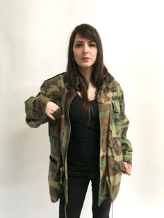 Classic camo army jacket in a midweight. Easy, goes with everything casual cotton coat. Nicely broken in and worn. Best fits S/MMeasurements:Shoulders: 18.5inBust: 20.5inWaist: 20inHips: 22inLength: 29.5inSleeve length: 23.5in Combat Style Utility Jacket With Long Sleeves For Fall, Combat Style Long Sleeve Utility Jacket For Fall, Combat Style Parka For Fall Streetwear, Fall Combat Parka For Streetwear, Combat Style Fall Parka For Streetwear, Long Sleeve Camouflage Utility Jacket, Khaki Combat Outerwear For Fall, Combat Style Camouflage Utility Jacket For Fall, Fall Combat Camouflage Utility Jacket