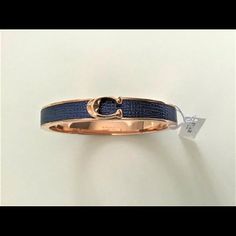 Brand New Coach Signature Push Hinged Bangle Bracelet *Sold Out Color* 100% Authentic Coach Rose Gold Signature "C" On Midnight Navy Blue Leather Midnight Navy Blue / Rose Gold Rose Gold Plated Brass Push Magnetic Hinged Closure Perfect For An Casual Day Out Or A Special Event Style F76634 Msrp $98 Luxury Adjustable Bracelet By Coach, Luxury Adjustable Coach Bracelets, Luxury Adjustable Coach Bracelet, Chic Coach Bangle Bracelet, Elegant Adjustable Coach Bracelets, Formal Adjustable Coach Bracelets, Coach Adjustable Jewelry For Party, Chic Blue Jewelry For Formal Occasions, Chic Coach Bracelet Jewelry