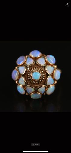 Exquisite vintage Opal Thai Princess Ring with round and pear shaped cabochon Opals. 14Kt yellow gold. Total weight is 3.30g. Stones are 3.00-5.00 x 3.00MM. This piece is an attention grabber in an situation. Victorian Cluster Ring With Multi-stone, Victorian Multi-stone Cluster Ring, Vintage Collectible Opal Gemstone Ring, Yellow Gold Opal Ring Collectible Antique Style, Vintage Opal Ring In 14k Gold, Antique Yellow Gold Opal Ring For Collectors, Vintage Multi-stone Cluster Ring, Vintage 14k Gold Opal Ring, Vintage Multi-stone Oval Cabochon Rings