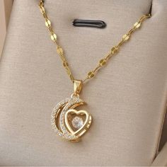 New Gold Plated Stainless Steel Moon And Heart Pendant Necklace Round Stone Inside Heart That Shimmers With Motion. Lobster Clasp Closure With Extender Approx. 15.5-18” Heart Pendant Necklace, Heart Necklace, Heart Pendant, Womens Jewelry Necklace, Lobster Clasp, Gold Plate, Motion, Jewelry Necklaces, Plating