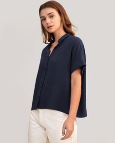 A favorite, refreshed. The Boxy Fit Short Sleeve Shirt has a classic collar, a clean button front, oversized grown-on sleeves, and a relaxed boxy fit. Dress it up with trousers and heels, or down with your favorite jeans for a casual-yet-polished look. 18 Momme Crepe De Chine Silk, Lightweight and Wrinkle-Resistant Shirt Collar Regular Fit Effortless Collared Shirt With Button Closure, Effortless Daywear Top With Spread Collar, Modern Everyday Tops With Button Cuffs, Modern Tops With Button Cuffs For Everyday, Relaxed Collared Blouse For Daywear, Effortless Button-up Top In A Specific Color, Modern Everyday Tops With Button Closure, Relaxed Collared Shirt For Daywear, Relaxed Collared Top With Button Closure