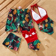 Introducing Our Floral Drawstring Swim Trunks & Halter Top Swimsuit: Perfect for Summer Get ready for some fun in the sun with our Floral Drawstring Swim Trunks & Halter Top Swimsuit! Whether you're planning a tropical vacation or a day at the beach, this stylish swimwear set is the perfect choice for the whole family. Product Details: Material: Polyester Product Introduction: The perfect family outfit for a tropical holiday - Tropical Paradise Swimsuit. Fabric Composition: Dad/Boy: 90% polyester + 10% spandex Mom/Girl: Lower Body: 90% polyester + 10% spandex Upper Body: 80% nylon + 20% spandex Lining: 90% polyester + 10% spandex Care Instruction: Machine wash in cold water, do not dry clean or bleach, low-temperature ironing recommended. Key Features: Adjustable drawstring swim trunks for Halter Top Swimsuit, Red Halter Top, Tropical Holiday, Swimsuit Fabric, Swimsuit Material, Top Halter, Swimwear Sets, Plant Pattern, Holiday Prints