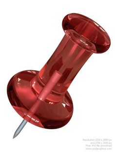 a red glass object with a knife sticking out of it