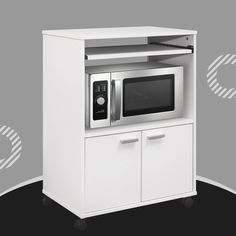 a white microwave oven sitting on top of a cabinet next to a black and gray wall