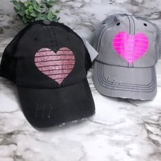 "Distressed \"dad\" hats. These are trucker hats with a more fitted look- fabric front(not foam) all with an adjustable back. One size fits most adults and teens." Trendy Black Trucker Hat As Gift, Trendy Black Snapback Hat As Gift, Pink Trucker Baseball Cap For Gift, Pink Trucker Baseball Cap As A Gift, Trucker Baseball Cap With Curved Brim As Gift, Trucker Baseball Cap With Curved Bill As Gift, Gift Trucker Hat With Curved Bill, Trucker Baseball Cap With Curved Bill, Trucker Hat With Curved Bill As Gift