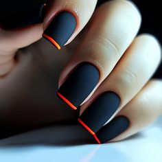 A bold and eye-catching manicure featuring black nails with a pop of orange. The nails are shaped into a square and finished with a matte top coat. Black Ombre Nails, Black Gel Nails, Orange Nail Designs, Nail Art Products, Matte Black Nails, Manicure Nail Designs, Matte Top Coat, Orange Nails, Gel Nail Designs