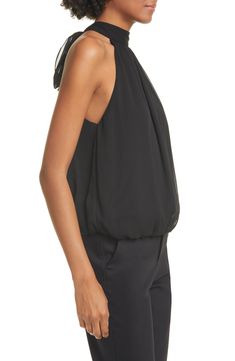 A party-ready top channels '70s chic in a blousy cut of crinkled crepe gathered to a high, halter-style neckline with feminine ties at the back. 21 1/2" center front length (size Medium) Ties at neck Band collar Sleeveless, with cutaway shoulders Lined 100% polyester Dry clean Imported Individualist Spring Evening Halter Neck Blouse, Chic Ruched Halter Neck Tops, Chic Ruched Halter Top For Evening, Chic Party Tops With Gathered Neckline, Summer Formal Ruched Tops, Formal Ruched Tops For Summer, Ruched Formal Tops For Summer, Chic Tops With Gathered Neckline, Chic Ruched Halter Top For Night Out