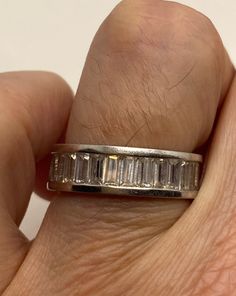 Hand made vintage eternity ring All pave set Cubic Zirconia in Sterling Silver My jeweler can re size for a $10-$20 fee All rings are shipped free in the US in a nice gift box. Check out our over a THOUSAND great reviews Engraving is $4 per letter and is not always perfect depending on the piece. It can take a few days if the jeweler is busy. This is payable to Paypal Judithsltd@gmail.com Gift Emerald Cut Eternity Band With Prong Setting, Timeless Emerald Cut Eternity Band Gift, Emerald Cut Eternity Band With Prong Setting Gift, Emerald Cut Eternity Band With Vvs Clarity As Gift, Emerald Cut Eternity Band With Vvs Clarity, Emerald Cut Channel Set Diamond Ring Gift, Classic Emerald-cut Eternity Band Gift, Classic Emerald Cut Eternity Band As Gift, Silver Emerald Cut Eternity Band As Gift