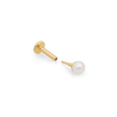 These freshwater pearl studs are an elegant way to dress up any outfit. Created in brightly polished solid 14k gold, these lightweight and hypoallergenic flat-back earrings are perfect for everyday wear. Size: 2.5MM, 3MM, or 4MM Gem: Pearl Color: Pearl Shape: Round Post Length: 5mm, 6.5mm, 8mm, or 10mm Solid 14k Yellow Gold Item sold singly Flat Back Pearl Earrings, Diamond Cleaner, Flat Back Earrings, Ear Stack, Earring Stud, Pearl Earring, Ear Rings, Water Pearls, Ear Cuffs