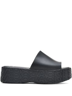 black slip-on style all-over embossed logo print branded insole flatform sole Modern Black Platform Slippers With Rubber Sole, Modern Black Platform Slippers With Textured Sole, Black Leather Flat Platform Slippers, Black Platform Slippers With Textured Sole, Black Platform Slippers With Textured Sole For Spring, Black Platform Slides In Synthetic Material, Black Platform Flat Slides, Black Flat Platform Slides, Summer Slides With Embossed Logo