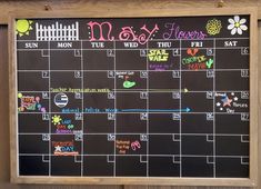 a chalk board with the calendar written on it