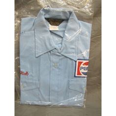 Fresh Find From An Ohio Farm Estate Is This Vintage Original Nos Pepsi Uniform Shirt W/ Patch Over Left Pocket Made In Usa Check Out My Other Items! Be Sure To Check Back As We're Always Listing New Cool Stuff And Don't Forget To Check Out All The Other Amazing Stuff We Have Listed Because We Really Love To Combine Shipping. Don’t Forget To Add Us To Your Favorite Sellers List And Sign Up For Our Newsletter For New Listings And Great Deals And Sales! Fitted Collared T-shirt With Pockets, Blue Crew Neck Shirt With Button Closure, Fitted Crew Neck Tops With Pockets, Pepsi Blue, Farm Estate, Uniform Shirt, Uniform Shirts, Cool Stuff, Don't Forget