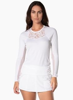 A sporty, mixed media long sleeve that brings performance rib fabric together with meshed-lined lace. Mesh paneling down the sleeves adds breathability while the ruched waistline creates a flattering fit. Stretch Mesh Lace Top, White Stretch Tops With Lace Trim, White Stretch Top With Lace Trim, White Tops With Contrast Lace For Spring, Spring White Tops With Contrast Lace, Spring White Top With Contrast Lace, White Lace Contrast Tops For Spring, White Casual Mesh Top With Mesh Sleeves, Casual White Mesh Top With Mesh Sleeves