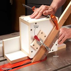 a person working with woodworking tools on a piece of equipment that is being worked on