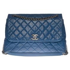 Rare Chanel Classic Maxi Flap bag in blue quilted lambskin leather, silver metal hardware, silver metal chain Flap closure, silver CC logo clasp 2-compartment canvas lining, 1 zipped pocket Signature: "Chanel® Made in Italy" Date: 2014/2015 Dimensions: 33 * 20 * 10 cm (12.99 * 7.87 * 3.93 In.) Chain length: 48 cm (18,89 In.) Reference: 1213371189 Packaging Hologram: Yes Authenticity card: Yes Dustbag: No Box: No General condition: 7/10 In very good condition despite tiny signs of wear on the lea Change Inspiration, Chanel Handbags Classic, Chanel Brand, Vintage Crossbody Bag, Flap Shoulder Bag, Pink Chanel, Classic Bags, Day Bag, Leather Silver