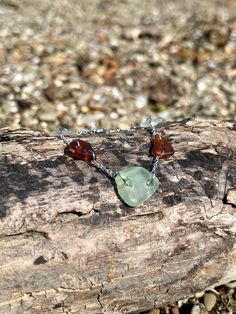 Each piece of Sea Glass is hand picked off the beach down the street from my home in Erie. It is then assembled into a bracelet by me at home. The chain is made of iron and is nickel free. Each item I source from this beach is special to me, and I hope you cherish it as I have. Please message me if you need a specific length for the bracelet and I will adjust it for you! This bracelet is currently about 6.5-7 inches. Adjustable Chain Bracelet For Beach, Beach Glass Bracelet Jewelry, Handmade Sea Glass Bracelet As Gift, Handmade Sea Glass Bracelet For Gift, Handmade Metal Bracelets For Beach, Sea Glass Bracelet, Erie Pa, Glass Bracelet, Hand Picked