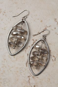 A fun pair of statement earrings, this artisan design rests at approximately 1.75" from sterling silver ear wires. Antique Silver Plated Brass (Lead & Nickel Free) Crystal 2.25" with sterling silver ear wires We hand select our natural materials, thus there may be slight variations in color and/or size that will not detract from the overall aesthetic. Our unique handcrafted designer jewelry for women is made in America, each design created individually in our personal design studio in Floyd, VA Artisan Sterling Silver Nickel-free Chandelier Earrings, Artisan Sterling Silver Chandelier Earrings Nickel Free, Nickel-free Unique Earrings, Nickel-free Silver Teardrop Wrap Earrings, Artisan Sterling Silver Nickel-free Teardrop Earrings, Silver Nickel-free Teardrop Wrap Earrings, Nickel Free Silver Teardrop Wrap Earrings, Unique Nickel-free Chandelier Drop Earrings, Unique Nickel-free Sterling Silver Chandelier Earrings