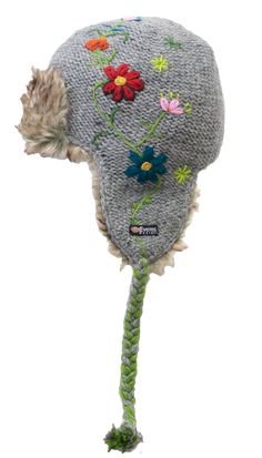 a knitted hat with flowers on it