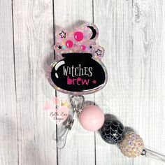 Personalized badge reel used to add bling to your scrubs, shirt pocket, and lanyard. A perfect gift for nurses, teachers, office staff and anyone needing to wear a badge. Personalized Black Badge Reel For Personal Use, Novelty Black Badge Reel For Halloween, Novelty Black Badge Reel Customizable, Customizable Novelty Black Badge Reel, Customizable Black Novelty Badge Reel, Halloween Gift Black Badge Reel, Black Badge Reel, Halloween Gift, Black Badge Reel For Halloween Gift, Black Halloween Badge Reel Gift