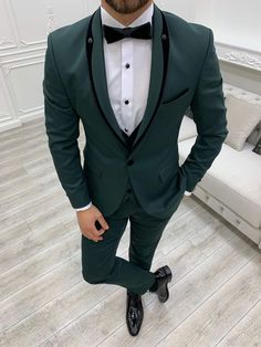 We're featuring a slim-fit buttoned shawl collar green tuxedo. From the HolloMen fall-winter '23 collection. Tuxedo Color: Green The suit's fabric includes 65% Polyester, 32% Viscone, and 3% Lycra. Its jacket has a shawl collar, double slits, flap pockets, and single buttons and it is fully canvassed. Suit Care Instructions: Dry clean only In your package, we will include a jacket, vest, pants, shirt, and bow tie. Our model wears EU50/US40. His height and weight are 180cm by 78kg respectively. B Green Three-piece Suit For Wedding, Green Three-piece Wedding Suit, Green Long Sleeve Three-piece Suit For Wedding, Green Three-piece Long Sleeve Wedding Suit, Green Single Breasted Wedding Suits, Green Formal Long Sleeve Suits, Elegant Tailored Dark Green Blazer, Fitted Green Three-piece Suit For Party, Elegant Green Suit With Notch Lapel