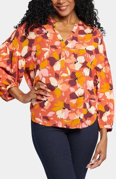 Amp up the pretty in your wardrobe with this polished peasant blouse that is framed dropped gathered sleeves and a button half placket. Button half placket Long sleeves 100% polyester Machine wash, line dry Imported Fall Tops With Printed Balloon Sleeves, Fall Tops With Balloon Sleeves And Printed Details, Fall Printed Tops With Balloon Sleeves, Spring Bishop Sleeve Blouse With Button Cuffs, Balloon Sleeve Blouse With Buttons For Fall, Multicolor Blouse With Gathered Sleeves, Spring Bishop Sleeve Blouse With Buttons, Spring Bishop Sleeve Blouse With Button Closure, Multicolor Puff Sleeve Blouse For Fall