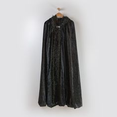 This cloak is the perfect costume accessory for any cosplay, LARP, DC or Wonder Woman event. This cloak has a black faux fur trim and the hood is larger than our regular hooded cloaks. Sizing: These cloaks come in three sizes: Small (Kids - 30" long), Medium (Small Adult - 48"), Large (Regular adult - 58"). Care: Hand wash or spot clean as needed, hang dry or flat lay. Dc Costumes, Medieval Cloak, Black Cloak, Justice League Wonder Woman, Wonder Woman Art, Superhero Cosplay, Glitter Headbands, Wonder Woman Costume, Small Kids