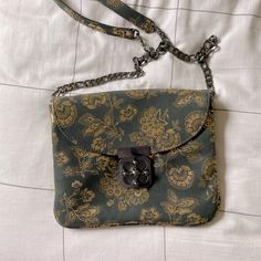 Beautiful Bag With A Super Unique Closure That Twists And Opens Like A Puzzle. I’ve Never Reached For This One, So Hoping To Pass It On To Someone Who Can Give It More Love Than I Will! Smoke Free Home. Shoulder To Top Is About 18.5” Bag Is 9.5” Wide And Just Over 8” In Height. Green Bags With Magnetic Closure For Everyday Use, Green Bag With Magnetic Closure For Everyday Use, Green Everyday Bag With Magnetic Closure, Everyday Green Bag With Magnetic Closure, Everyday Clutch Bag With Fold Over Clasp, Clutch Bag With Fold Over Clasp For Everyday Use, Everyday Clutch With Fold Over Clasp, Evening Bag With Detachable Strap In Gray, Gray Evening Bag With Detachable Handle