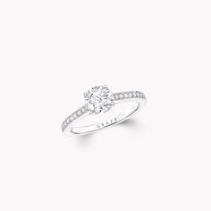 a diamond ring with the word love on it