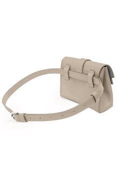 More than an elevated fanny pack, the Aria Belt Bag can fit any size phone, wallet, and other essentials. With exterior and interior loops, and an adjustable, removable leather strap, the Aria can be worn 5 ways: as a belt bag, a crossbody, a shoulder bag, a sling bag, or a clutch. Wear 5 Ways: Belt Bag, Sling, Shoulder, Crossbody, Clutch Scratch & water-resistant Italian Pebbled leather What Fits: Any size phone; card slots, interior zip pocket for essentials Removable and adjustable leather st Phone Card, Crossbody Clutch, Phone Wallet, 5 Ways, Sling Bag, Fanny Pack, Belt Bag, Pebbled Leather, Card Slots