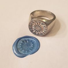 This signet ring is cast in lead-free pewter. The ring size when cast is 7.25. The sealing image is the a nest of the white-spotted pufferfish. The male pufferfish builds these nests as part of the courtship process to attract a mate. This is part of a series of signet rings I am making cast from lead-free pewter. Each master ring is hand sculpted to give a unique, rustic style, multi-dimensional relief image when used as a stamp to seal, with sealing wax. Pewter Ring, Resize Ring, Puffer Fish, Silver Fish, Multi Dimensional, Signet Rings, Sealing Wax, Wax Seal, Wax Seals