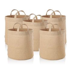 six natural jute storage baskets with handles