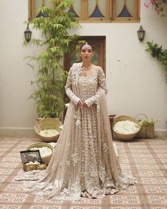 Beige Lehenga With Resham Embroidery In Georgette, Beige Georgette Lehenga With Resham Embroidery, Bollywood Style Dress With Traditional Drape In Net, Semi-stitched Net Gown For Eid, Eid Semi-stitched Net Gown, Designer Dresses With Resham Embroidery On Net, Anarkali Organza Gown For Traditional Ceremonies, Anarkali Net Gown Floor-length, Anarkali Floor-length Net Gown