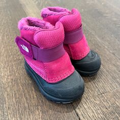 The Warm And Waterproof Toddler Snow Boots Were Worn Once For 15 Minutes. They’re Basically Brand New! Color Is Cabaret Pink And Tnf Black. Easy Velcro Closure, Soft And Plush Faux Fur Lining. -Ballistic Mesh Upper With Waterproof-Leather Overlays -Cemented And Seam-Sealed Waterproof Construction 200 G Heatseeker Eco Insulation For Exceptional Warmth -Durable Tpr Shell Bottom And Outsole For Traction And Protection From The Elements Purple Waterproof Outdoor Boots, Waterproof Purple Outdoor Boots, Pink Waterproof Winter Boots With Round Toe, Pink Weatherproof Winter Boots, Purple Waterproof Boots With Round Toe, Purple Waterproof Round Toe Boots, Winter Pink Waterproof Boots, Pink Non-slip Boots With Round Toe, Pink Closed Toe Winter Boots